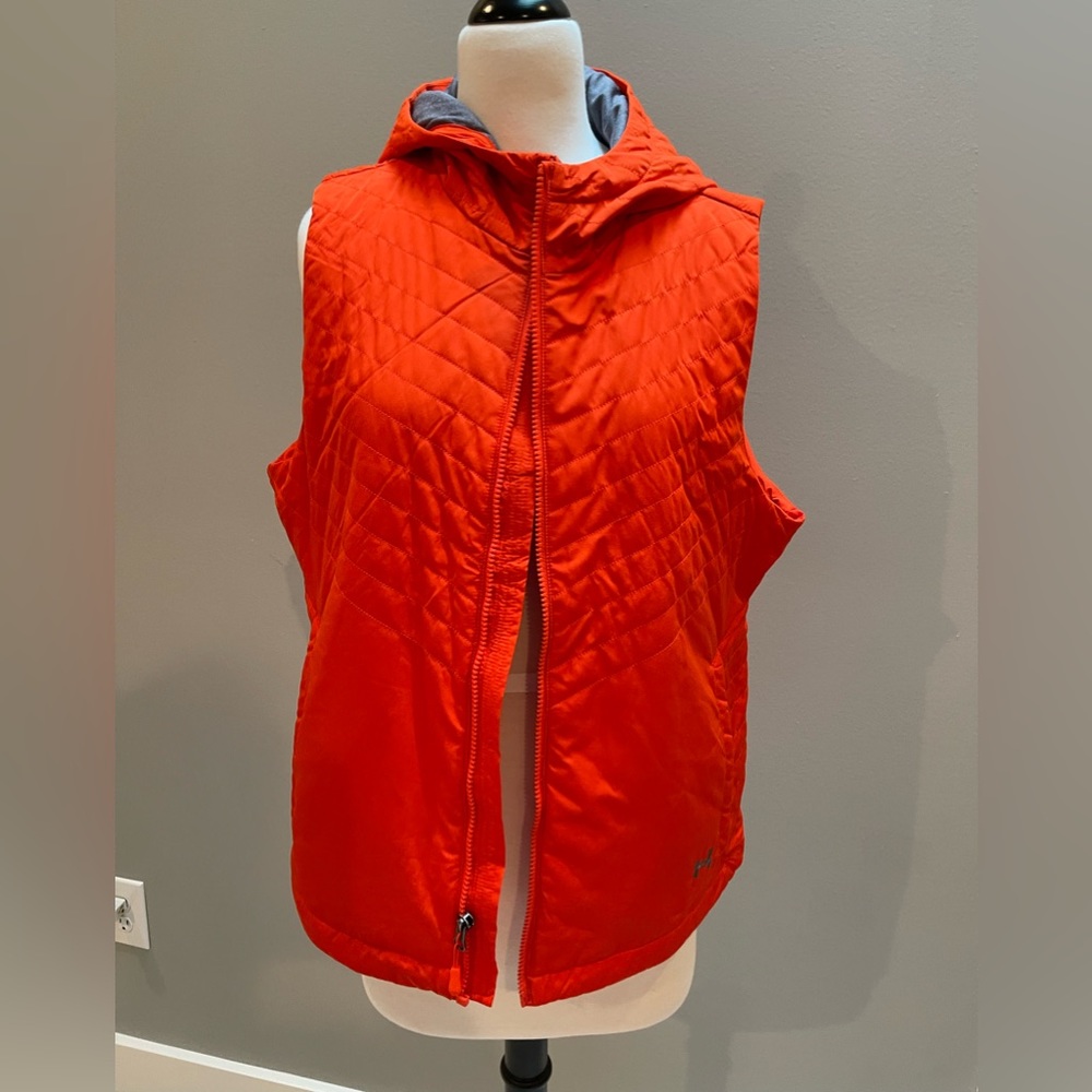 Never worn! Under Armour hooded vest. Size L